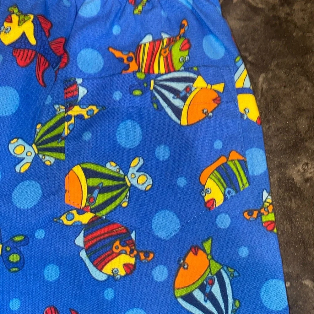 Flap Happy Bright Blue Boys Swim Trunks with Colorful Fish Print